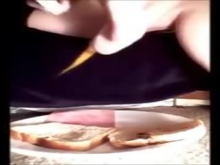 Charming brunete cookie making tasty jam sendwiç for.